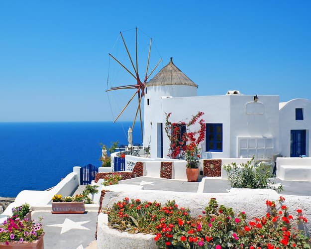Image - Beach holiday in Santorini, Greece - July 2026