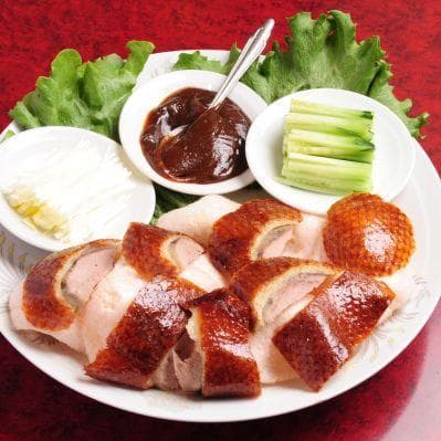 Assaggiare l’anatra laccata, il piatto imperiale per eccellenza - Pechino