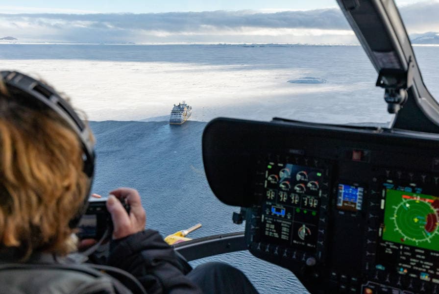 Antarctica by Helicopter: Crossing the Circle and the Peninsula