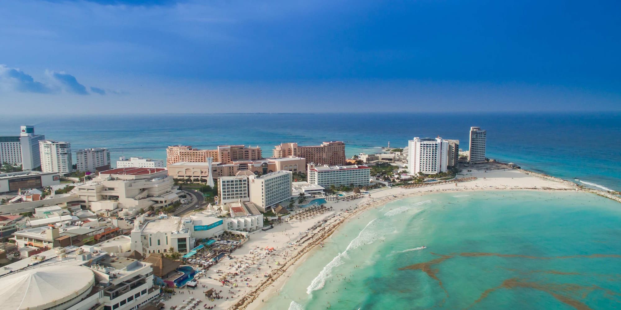 Visit to Izamal and return to Cancún.