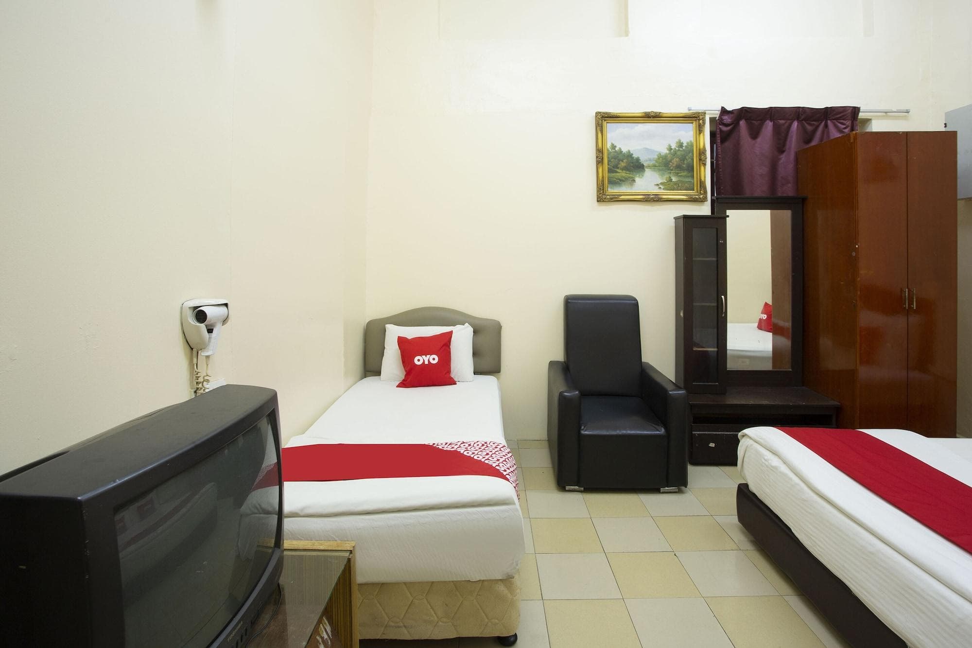 SPOT ON 90137 Casavilla Hotel Pudu, Room