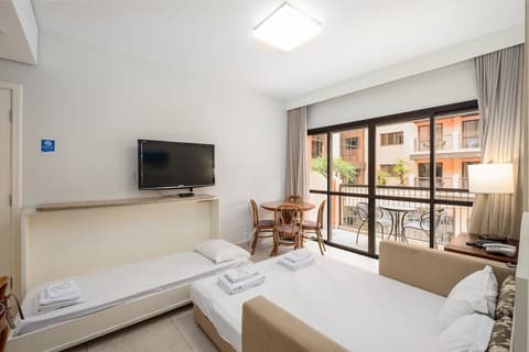 Studios modernos à beira-mar - Jurerê Beach Village JBVTOP, Room