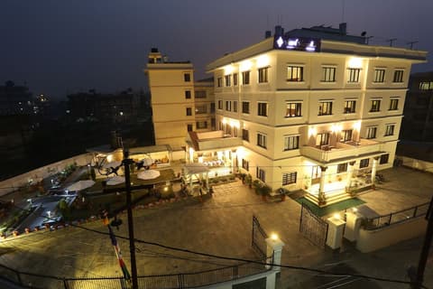 Hotel Harmika, Front of property - evening/night