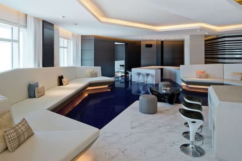 V Hotel Dubai, Curio Collection by Hilton, Living area