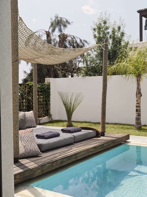 Aulus Lindos Rhodes Resort, Curio Collection by Hilton, Living area