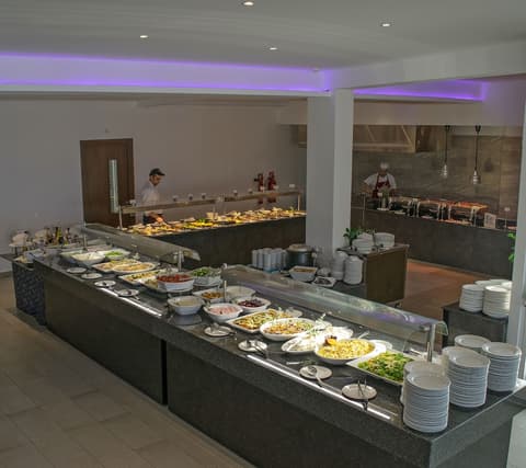 Theo Sunset Bay Hotel, Dining