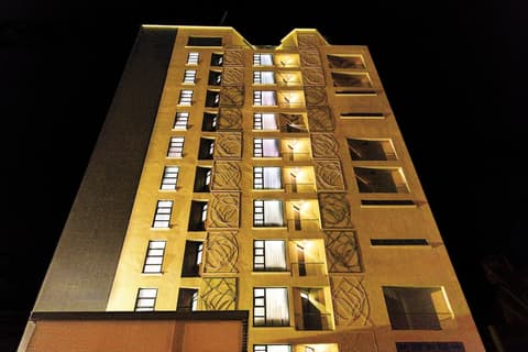 L'Aziz Suites, Front of property - evening/night