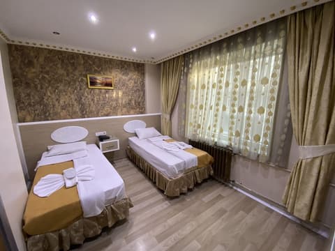 Grand Oral Hotel, Room