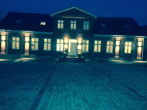 A charming farmhouse, Front of property - evening/night