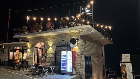 Te Gjyshi (at Grandfather), Front of property