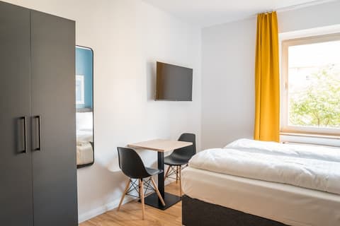 Antares Apartments, Room