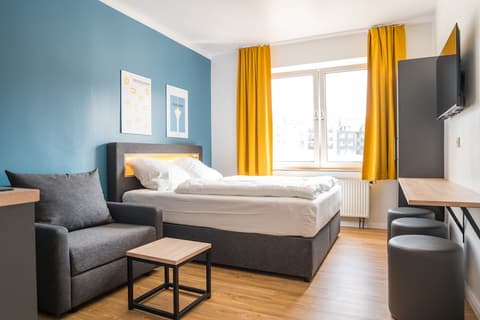 Antares Apartments, Room