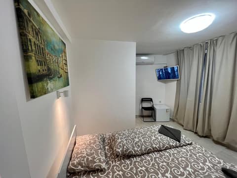 The rainbow 1 & free motorcycle parking, 