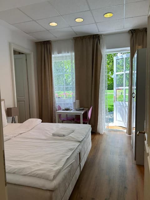 Apartment mit Gartenblick und Terrasse, 