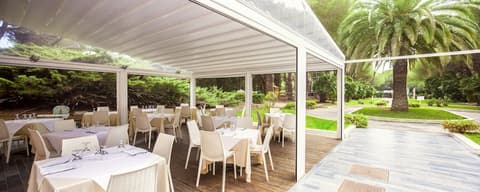 Uappala Hotel Lacona Garden - GATTINONI, Ristorazione all'aperto