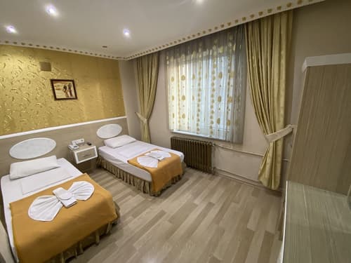 Grand Oral Hotel, Room
