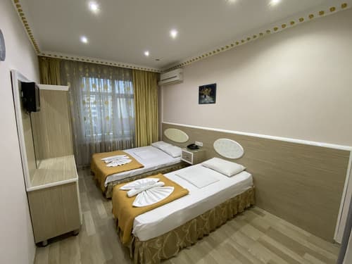 Grand Oral Hotel, Room