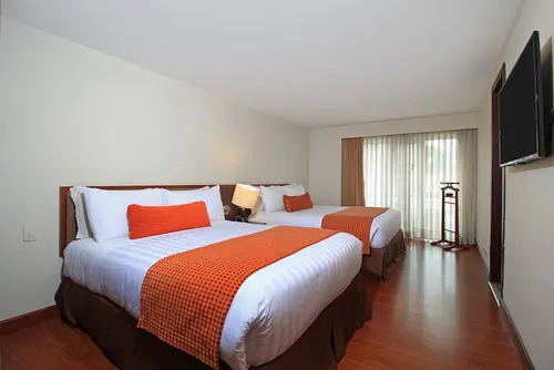 Hotel Windsor House Inn By GEH Suites, Room
